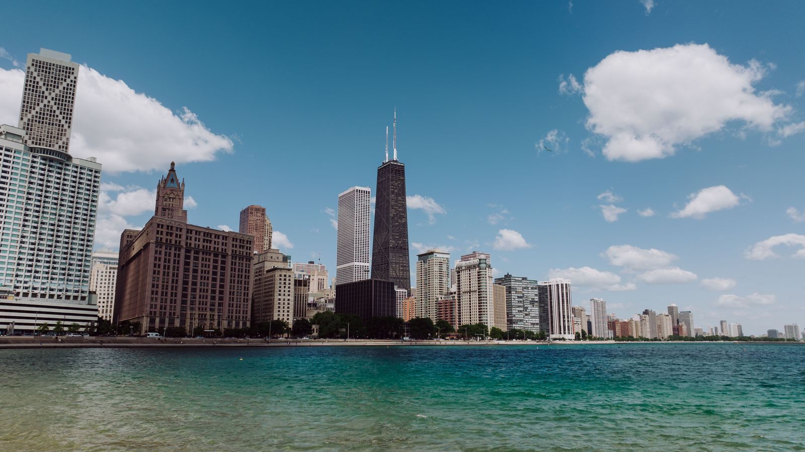 Chicago skyline above Lake Michigan on a clear day, where cruises from Chicago begin